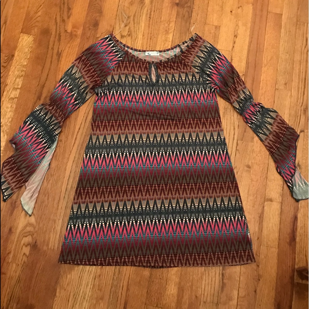 Patterned bell sleeve dress.